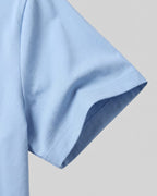 תקריב שרוול ובד — חולצת Signature Oxford תכלת